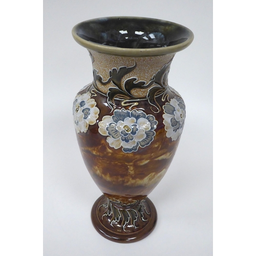 121 - A late Victorian Doulton Lambeth stoneware vase of ovoid pedestal form, decorated in colours with st... 