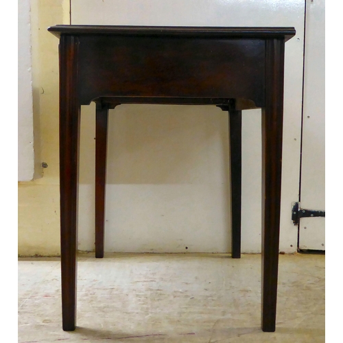 125 - A George III mahogany single drawer side table, raised on square legs  27