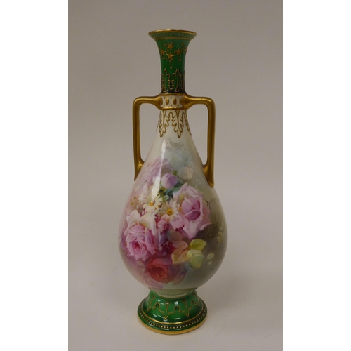 129 - A Royal Doulton china pedestal ovoid shape, twin handled vase, decorated with roses and other flora ... 