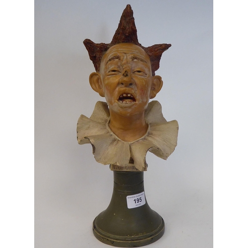 195 - A Late 19th Century painted pottery bust, the clown Grimaldi, on an integral socle  15