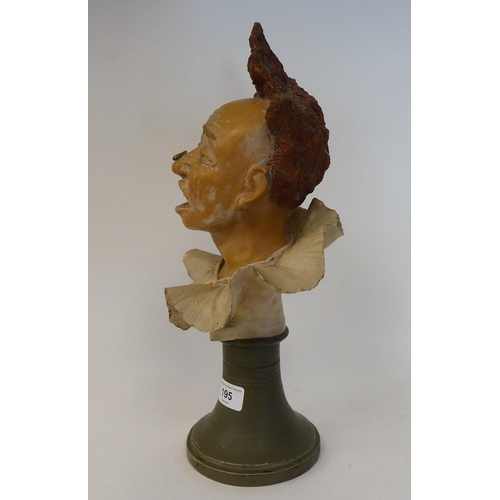 195 - A Late 19th Century painted pottery bust, the clown Grimaldi, on an integral socle  15