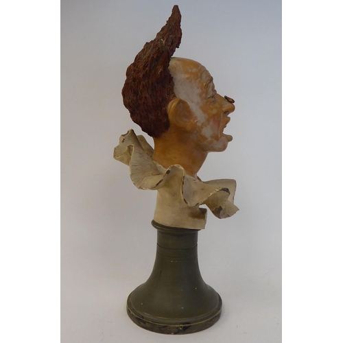 195 - A Late 19th Century painted pottery bust, the clown Grimaldi, on an integral socle  15