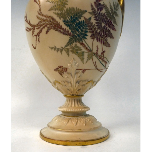 202 - A Royal Worcester blush ivory glazed, moulded and part gilded china ewer of ovoid form with a foliat... 