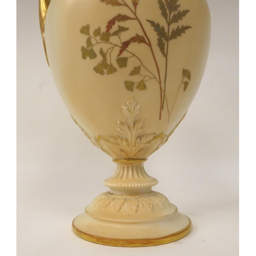 202 - A Royal Worcester blush ivory glazed, moulded and part gilded china ewer of ovoid form with a foliat... 