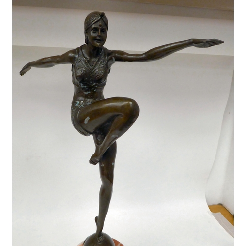 203 - After J.Philipp - a French Art Deco inspired cast and patinated bronze figure, a female dancer weari... 