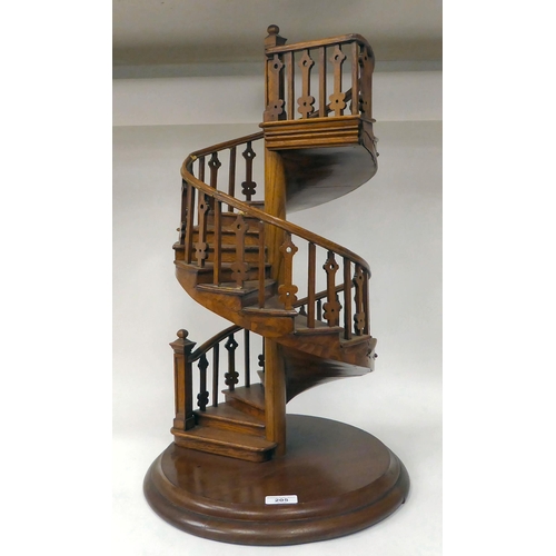 205 - A scratch built model in oak, a study of a double spiral staircase, on a circular plinth  26