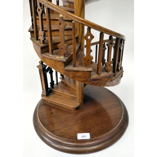 205 - A scratch built model in oak, a study of a double spiral staircase, on a circular plinth  26