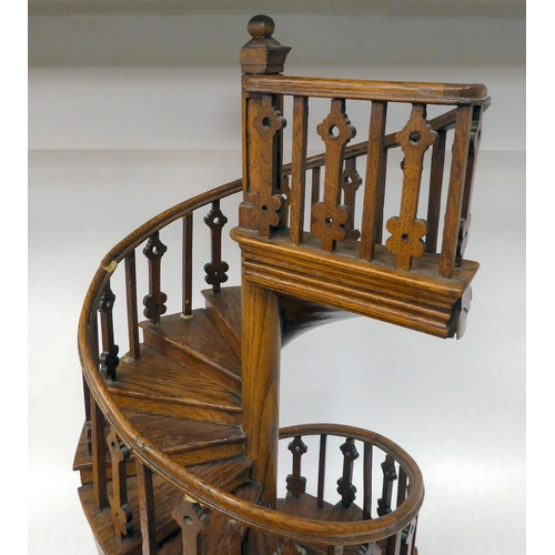 205 - A scratch built model in oak, a study of a double spiral staircase, on a circular plinth  26