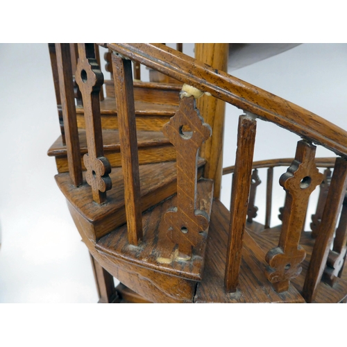 205 - A scratch built model in oak, a study of a double spiral staircase, on a circular plinth  26