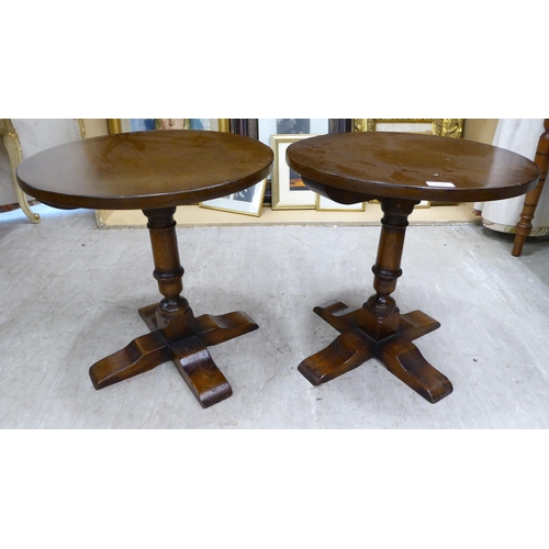 210 - A pair of (probably) Titchmarsh & Goodwin, traditional Old English style, oak pedestal wine tabl... 