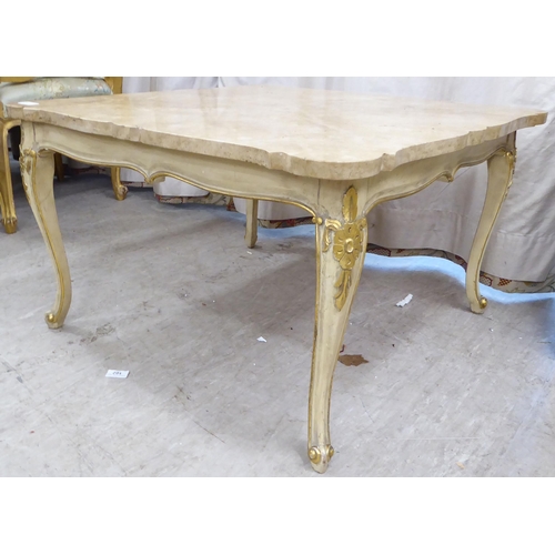 227 - A modern coffee table, the serpentine outlined marble top raised on cream and gilt painted cabriole ... 