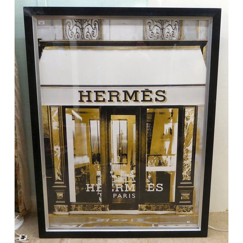 228 - A coloured print depicting a Hermes retailer in Paris  54