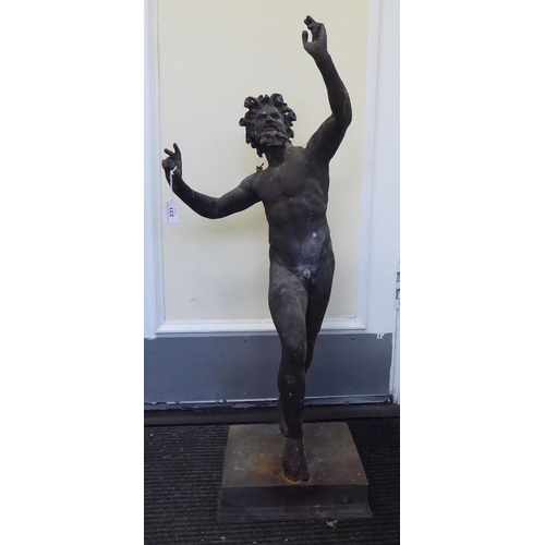 231 - A cast bronze figure, a Greek satyr 'The Dancing Faun of Pompeii' with horns and a tail, on a square... 