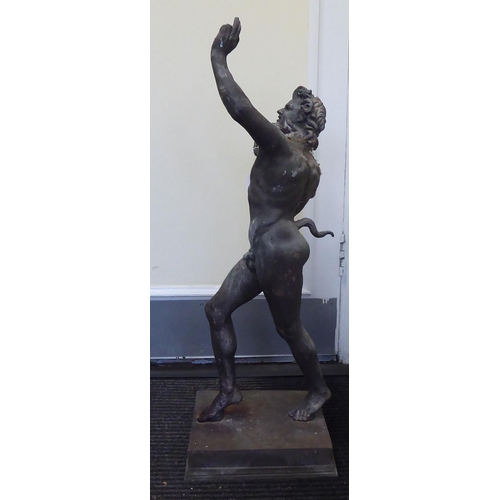 231 - A cast bronze figure, a Greek satyr 'The Dancing Faun of Pompeii' with horns and a tail, on a square... 