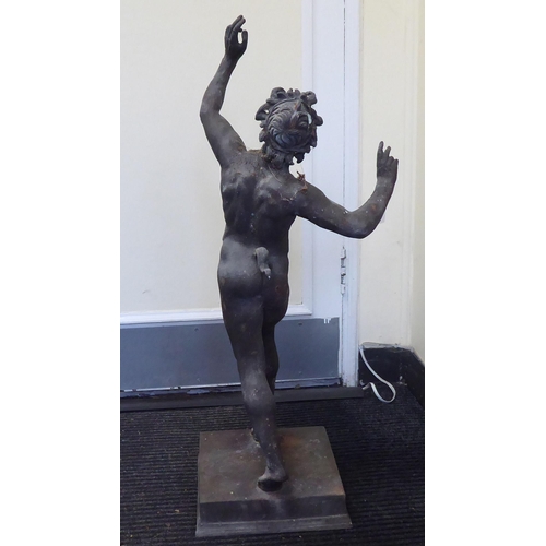 231 - A cast bronze figure, a Greek satyr 'The Dancing Faun of Pompeii' with horns and a tail, on a square... 