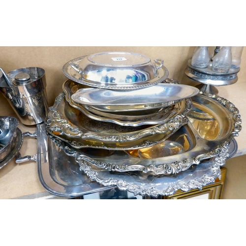 232 - Silver plate and similar tableware: to include lidded oval tureens; and serving plates/trays  l... 