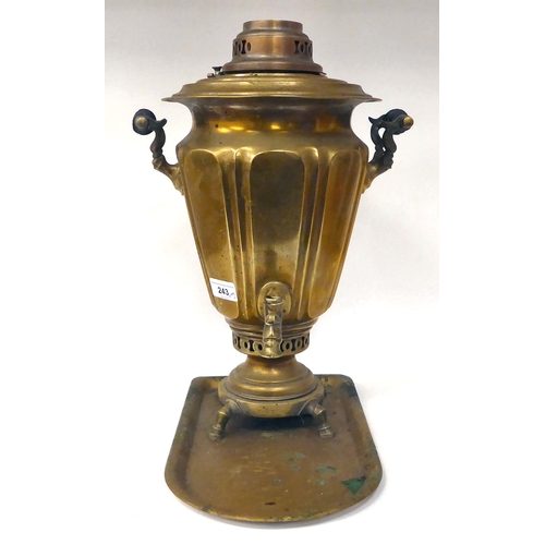 243 - A Russian brass samovar of tapered and panelled form with twin handles and a horizontal top, raised ... 