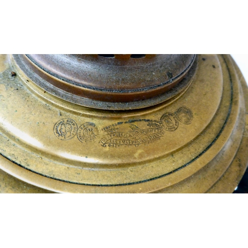 243 - A Russian brass samovar of tapered and panelled form with twin handles and a horizontal top, raised ... 