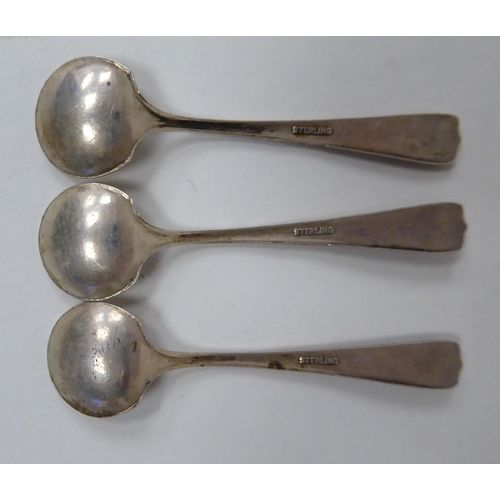 258 - Various Sterling silver flatware: to include a pair of serving tongs, spoons and forks  (combin... 