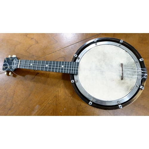 262 - A Savana four string banjo  cased