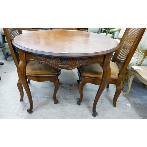 267 - A modern French inspired mahogany centre table, raised on cabriole legs  29