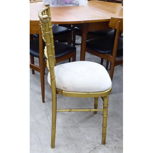 269 - A gilt sprayed, bamboo effect bedroom chair with a mushroom coloured upholstered seat