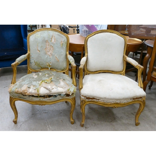 270 - A pair of late 19thC French gilded pine, showwood framed, open arm salon chairs, raised on cabriole ... 