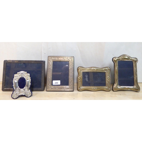 280 - Four dissimilar silver photograph frames  mixed marks  approx. 4