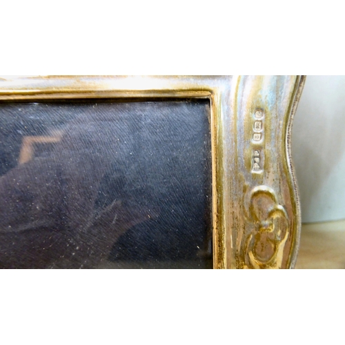 280 - Four dissimilar silver photograph frames  mixed marks  approx. 4