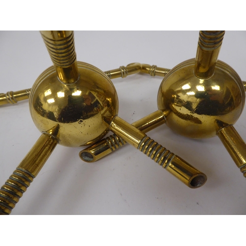 31 - A pair of late Victorian brass hearth implement racks, on decoratively turned, tripod legs  7