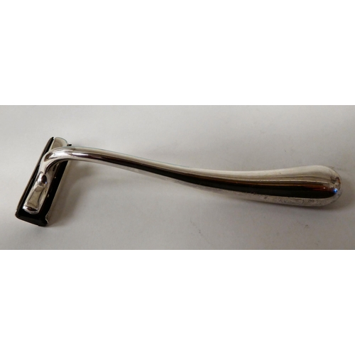 361 - A Tiffany & Co 925 silver razor, designed by Elsa Peretti  boxed