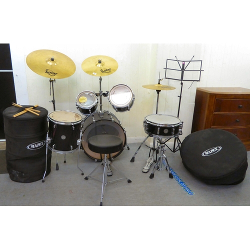 394 - A Mapex eight piece drum set 