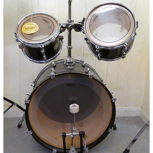 394 - A Mapex eight piece drum set 