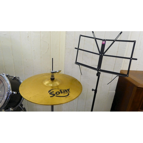 394 - A Mapex eight piece drum set 