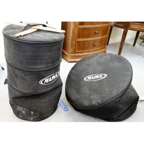 394 - A Mapex eight piece drum set 