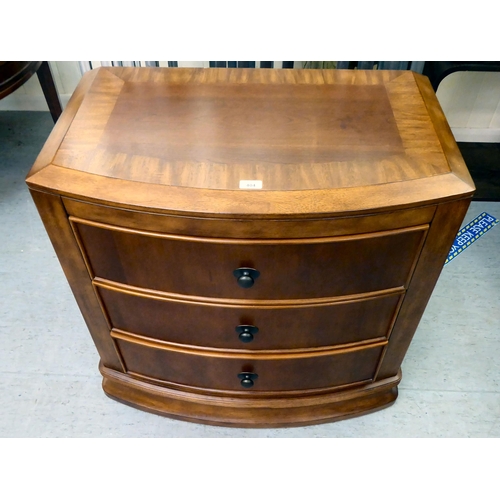 404 - A modern mahogany finished bowfront, three drawer dressing chest, on a plinth  32