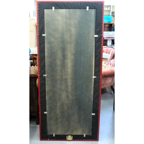 406 - A modern mirror with a red hide upholstered frame  70