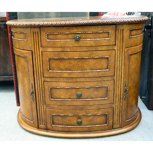 407 - A modern walnut finished bowfront sideboard with four drawers/two doors, on a plinth  32