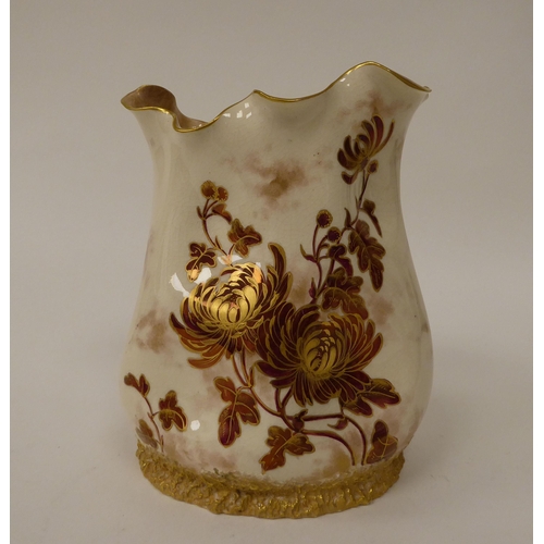 41 - A late Victorian Doulton Burslem china bag vase of oval outline with a crimped rim, decorated in gil... 