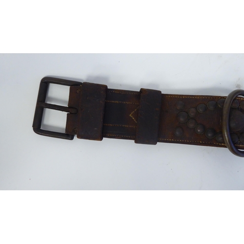 45 - A late 19th/early 20thC stitched brown hide, buckled dog collar with decorative studwork and a brass... 