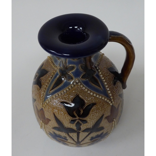 46 - A Royal Doulton stoneware jug of bulbous form with a narrow neck, strap handle and flared rim, decor... 