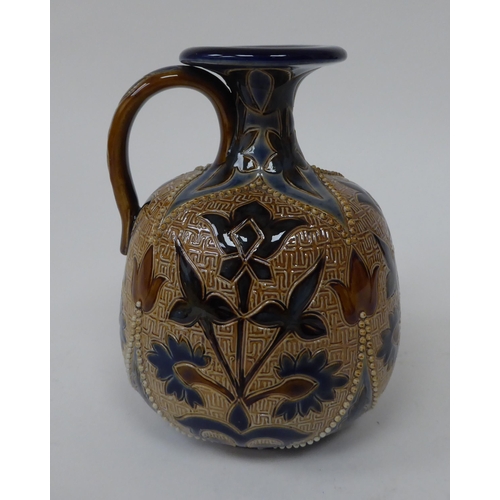 46 - A Royal Doulton stoneware jug of bulbous form with a narrow neck, strap handle and flared rim, decor... 