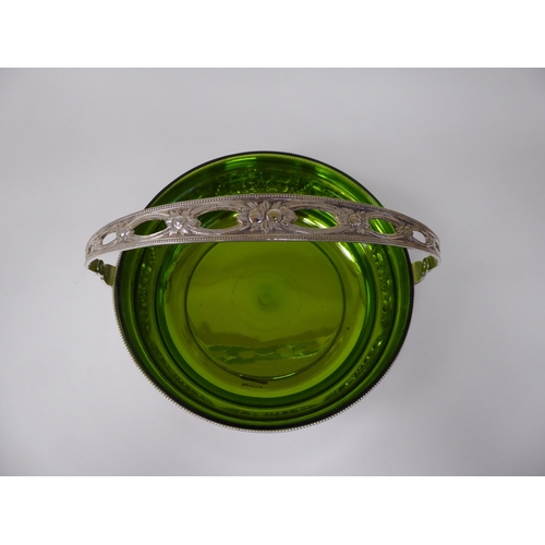 47 - An early 19thC WMF electroplated fruit dish and semi-opaque green glass liner, decorated with a frie... 