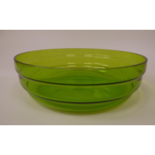 47 - An early 19thC WMF electroplated fruit dish and semi-opaque green glass liner, decorated with a frie... 