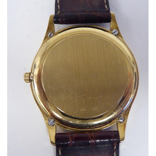 50 - An Omega Seamaster 9ct gold cased wristwatch, faced by a gilded baton and Roman dial, seconds hand a... 