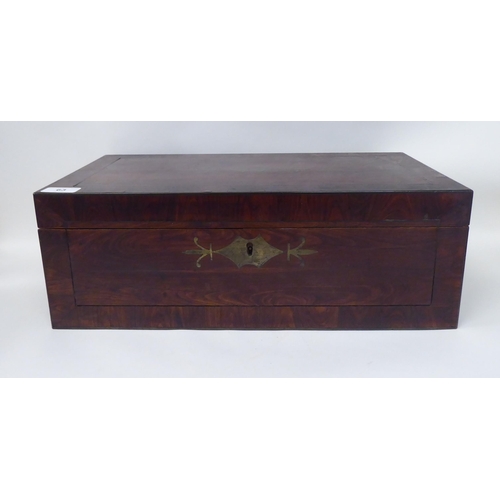 63 - A mid 19thC hardwood writing slope with inlaid brass ornament, opposing handles and crossbanded deco... 