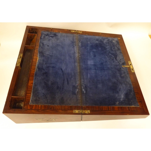 63 - A mid 19thC hardwood writing slope with inlaid brass ornament, opposing handles and crossbanded deco... 