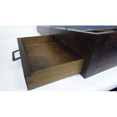 63 - A mid 19thC hardwood writing slope with inlaid brass ornament, opposing handles and crossbanded deco... 