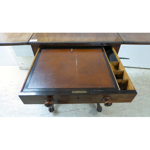 66 - A Regency rosewood combination writing/sewing table with two drawers, over a deep fabric covered dra... 