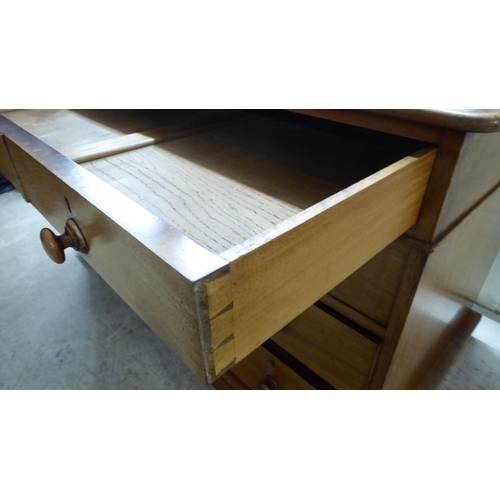 70 - A late Victorian mahogany nine drawer, twin pedestal desk, on a plinth  28